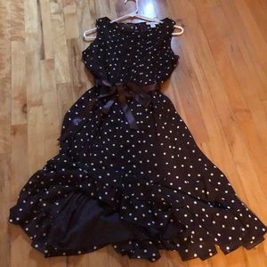 Ruffle hem brown with white dots dress.